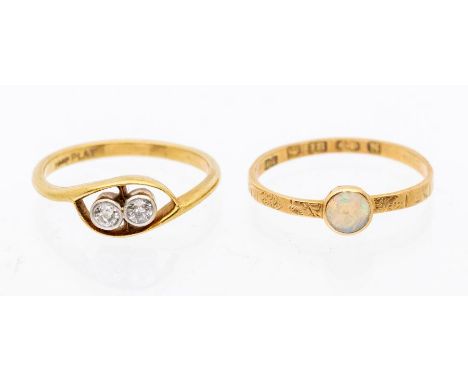 Two early 20th century rings including a two stone diamond and 18ct gold ring, comprising old cut diamonds approx 0.10ct in t