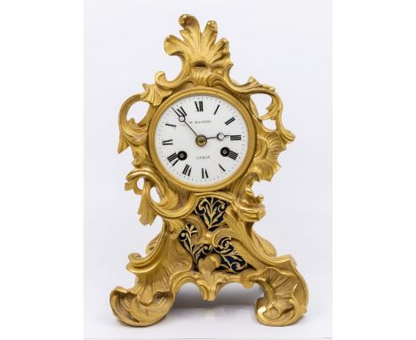 M. Rango of Paris France, mantel clock in a gilded cast metal case lovely castings of swages and leafs. Pierced fretwork belo