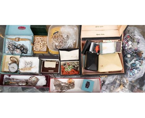 A collection of vintage and later costume jewellery to include a weighable 9ct gold brooch, a silver cushion shaped vesta cas