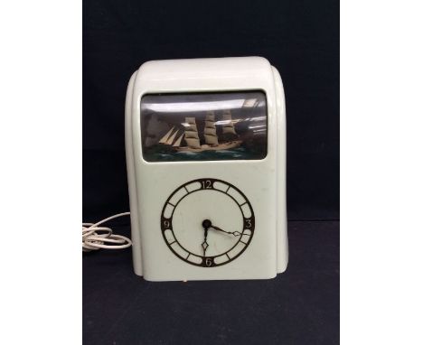 1950s Bakelite electrical clock with ship movement to the top