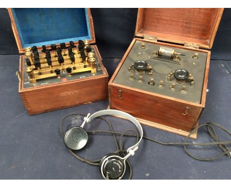  An early to mid 20th century G. Brown Ltd communication valve radio in pine case, along with a cased instrument that registe