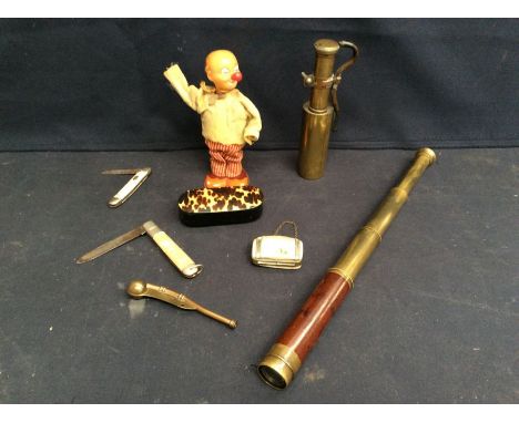 World War I trench art lighter lamp, 19th century pocket telescope, early 19th century tortoiseshell snuff box, two pen knive