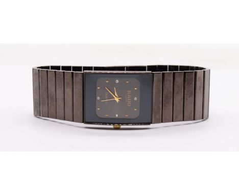 Rado- a ladies black 'Ceramica' quartz wristwatch, comprising a black dial with stone set and gold dot hour markers, case app