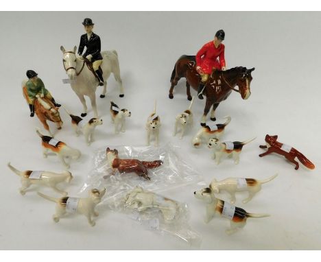 Beswick - A Hunting set consisting of both male and female riders on horseback, child on horseback, two foxes (one has two br