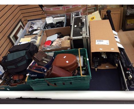 An extensive collection of camera/photography equipment to include; tri-pods, camera bags, reflectors, light parts, photograp