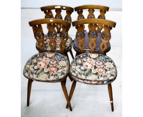 Four dark Ercol mid 20th century kitchen chairs with seat pads together with a mid 20th century oak standard lamp