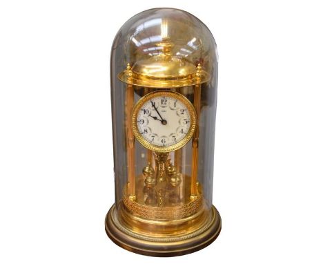An early 20th century German Kienzle dome anniversary clock, Adams dial with Arabic numeral indices, large in size, Height ap