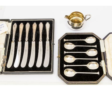 A collection of silver to include; a small Victorian plain milk jug, gilt interior, hallmarked Henry Wilkinson & Co, London, 