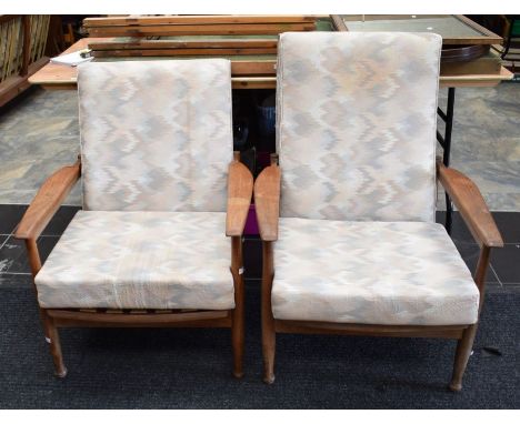 A Guy Rodgers 1960s teak and fabric 'Manhattan' sofa bed along with a pair of teak and fabric matching chairs. *** Sold as ho