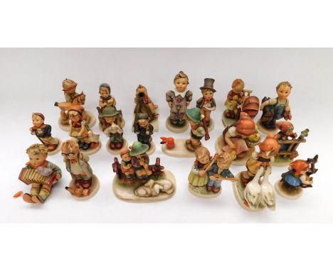 A collection of twenty assorted Hummel figures. Some signs of damage to some.