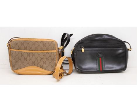 A black Gucci (1980) cross-body leather bag with Gucci tape to the front, front zipped pocket, zip closure and large pocket o