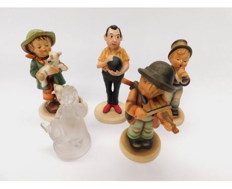 Goebel/MJ Hummel - A collection of five figurines to include; a modern lead crystal collection, a novelty Bowling related fig
