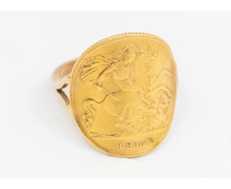 A coin ring, comprising a mounted 1912 half sovereign, to a yellow metal shank, size N, unmarked, weight approx 5gms   Furthe