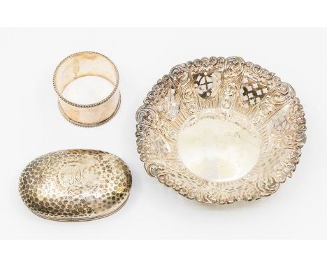 A group of silver to include; a London pierced silver dish, marks rubbed, along with a Birmingham silver circular napkin ring