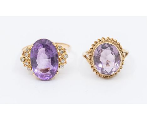 Two amethyst and 9ct gold rings, comprising one set with an oval mixed cut amethyst, approx 10 x 14mm,  with five small diamo