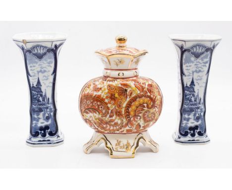 A Goebel pot-pourri/posy holder with gilt and floral design, together with a pair of modern Delft blue and white Dutch scene 