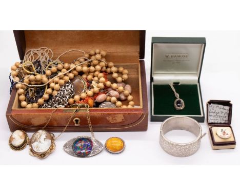 A collection of costume jewellery to include a silver guard chain, silver wide engraved bangle, silver Blue John and marcasit