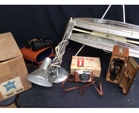 A collectors lot to include; a cased binoculars set, cased Yashica camera, modern anglepoise light, cased microscope, 20th Ce