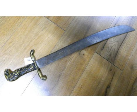 Brass handled machete/sword.  This bladed product is not for sale to people under the age of 18.  By bidding on this item you