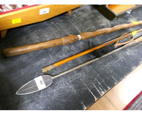 First C.V.A. swagger stick, wooden tribal stick and metal topped tribal spear.  This bladed product is not for sale to people