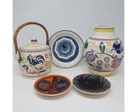 A Poole vase, decorated flowers, 21 cm high and various Poole pottery (qty) 