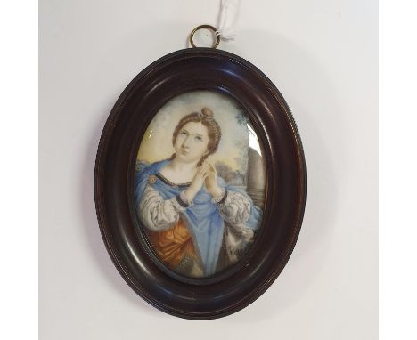 An early 20th century oval portrait miniature, of Saint Agnes, 10 x 7 cmOn Ivory, inscribed verso 