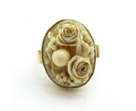 With carved plaque, ring size 18.