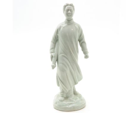 white decor, depicting Chinese man holding scroll, 32 cm. tall. 