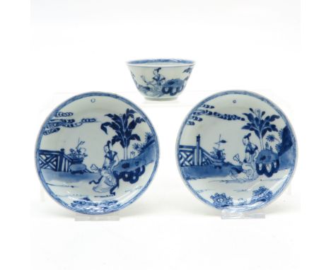China, including 1 cup and 2 saucers, blue and white decor, saucer 12 cm. diameter, chip and hairline.