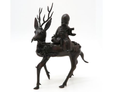Bronze, depicting deer with man, 39 cm. tall. 