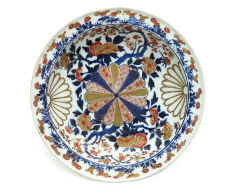 Imari decor, 25 cm. diameter, marked on the bottom with double ring, chip.