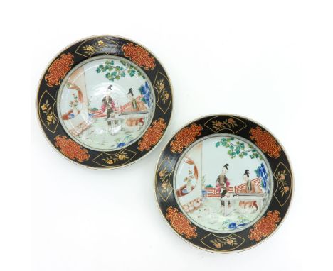 China, polychrome decor, depicting woman playing Chinese instrument, 23 cm. diameter, including chip. 