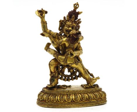 Buddha’s, bronze gilt, 19 cm. tall, finger restored. 