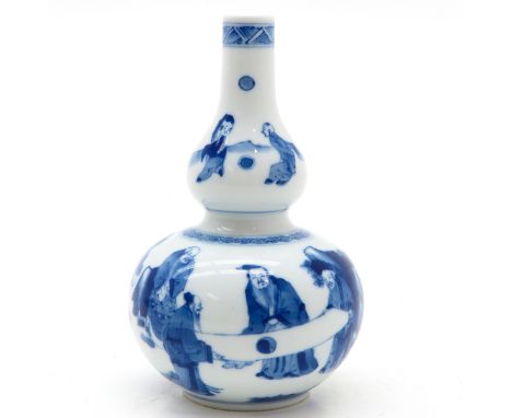 blue and white decor, depicting people, 16 cm. tall, marked on the bottom with double ring. 