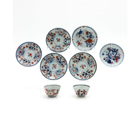 Imari decor, 8 items including 2 cups and 6 saucers, 12 cm. diameter, chip and hairline. 