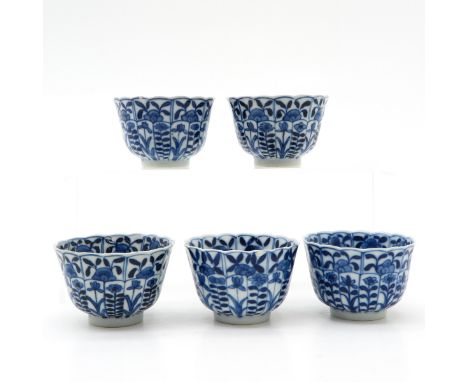 blue and white decor, marked on the bottom with double ring, 8 cm. diameter, chip and hairline. 