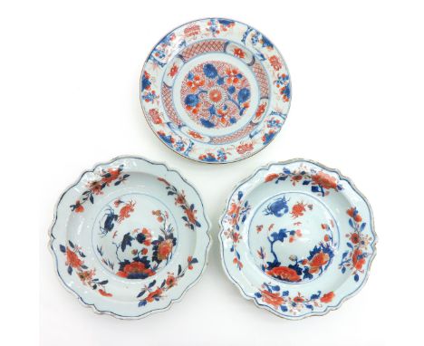 Imari decor, including 2 convex bottom plates, largest 23 cm. diameter, fritting and hairline.