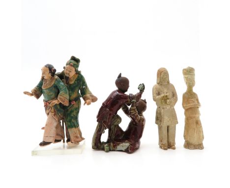 including playing children, tallest 23 cm. tall, including restoration.