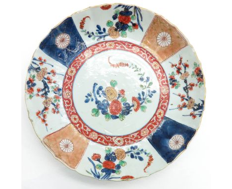 blue, white and red floral decor, marked on the bottom with double ring, 26 cm. diameter, chip. 