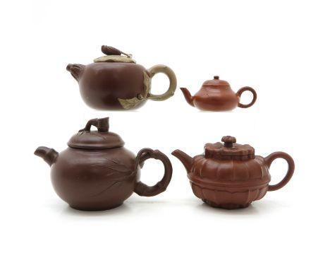 China, Yixing, including teapots marked on bottom and inside lid, tallest teapot 11 cm., restored.