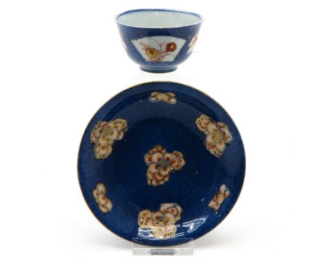 blue floral decor, marked on the bottom with mark and double ring, 11 cm. diameter, chip standring and hairline. 