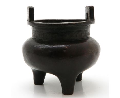 Bronze, 9 cm. in diameter.