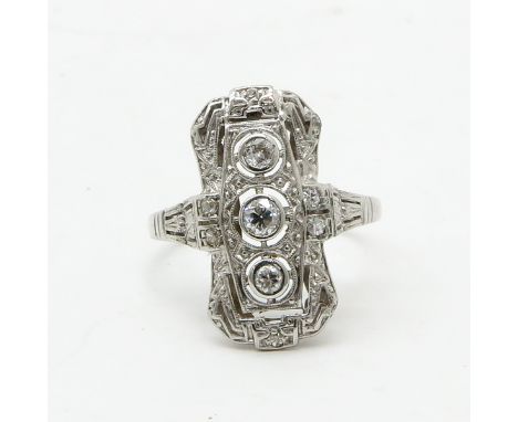 Set with 9 diamonds, ring size 17.