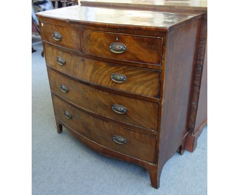 A George III bowfront mahogany chest of two short and three long graduated drawers, on splayed bracket feet, 102cm wide.