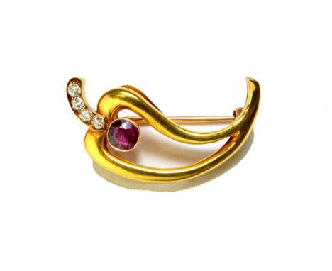 A Russian gold, ruby and diamond set brooch, modelled as a chilli pepper, collet set with a cushion shaped ruby and mounted w