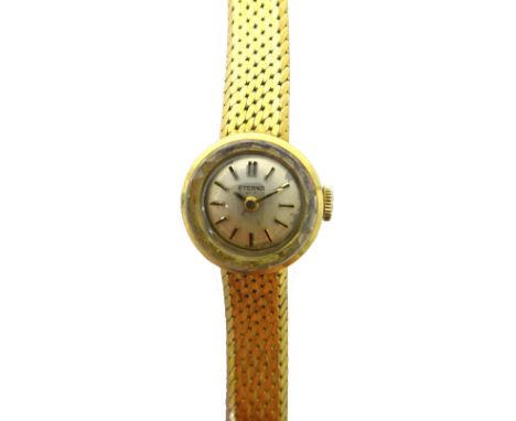 A lady's gold Eterna bracelet wristwatch, the signed circular silvered dial with baton shaped numerals, on a tapering woven m