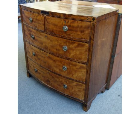 A George IV inlaid mahogany bowfront chest of two short and three long drawers, on bracket feet, 105cm wide.