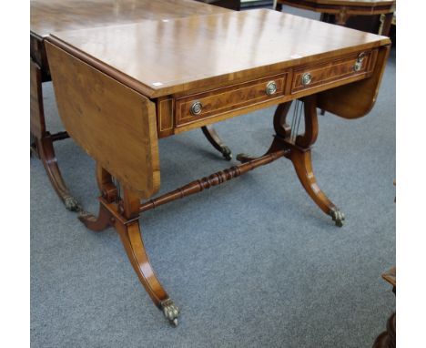 A yew wood sofa table of George III design with pair of frieze drawers on lyre supports, 96cm wide. 