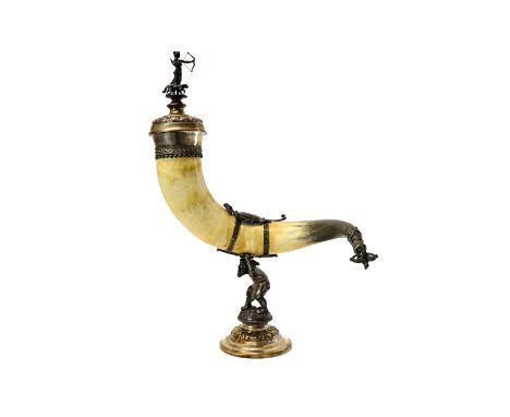 A silver plated metal mounted horn table centre piece, probably Scandinavian, circa 1890, the finial formed as the figure of 