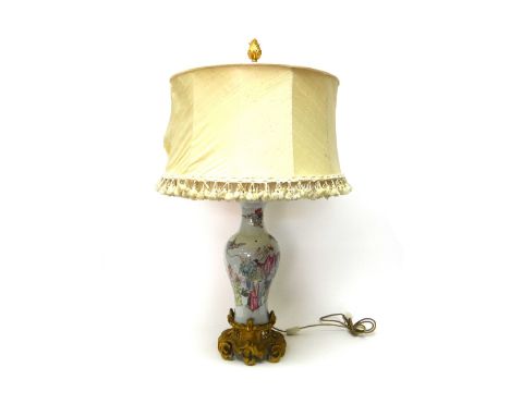 A Chinese ormolu-mounted famille-rose vase mounted as a table lamp, early 20th century, painted with figures, an elephant and